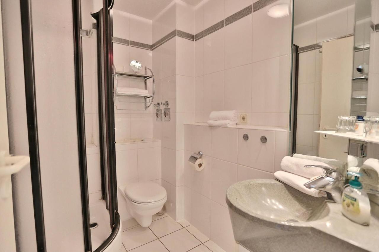 Strandschloesschen Strandschloesschen Appartement 4 ฮัฟฟ์ครูก ภายนอก รูปภาพ